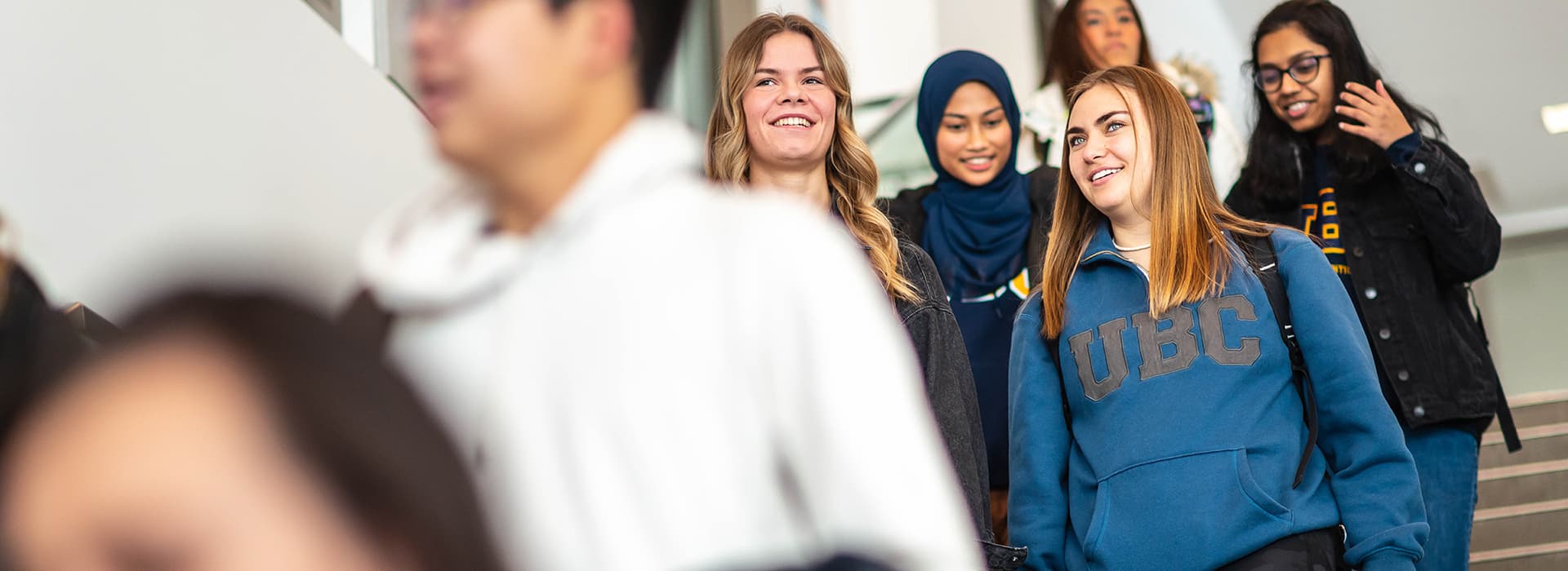 Students walking down a flight of stairs