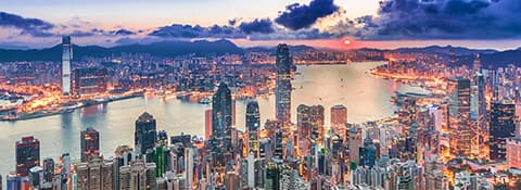 Aerial sunset shot of the Hong Kong skyline representing the Asia Pacific Regional Office
