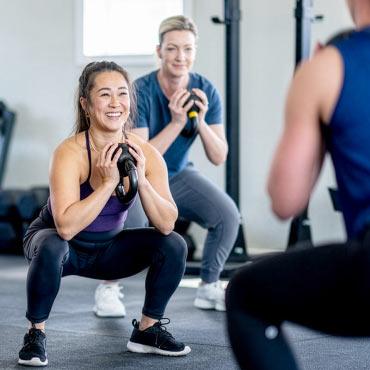 People exercising at a gym.